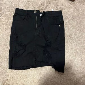 Black distressed denim skirt